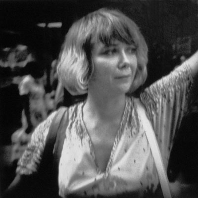 pretty blonde hailing taxi in midtown Manhattan on a hot day in 1983